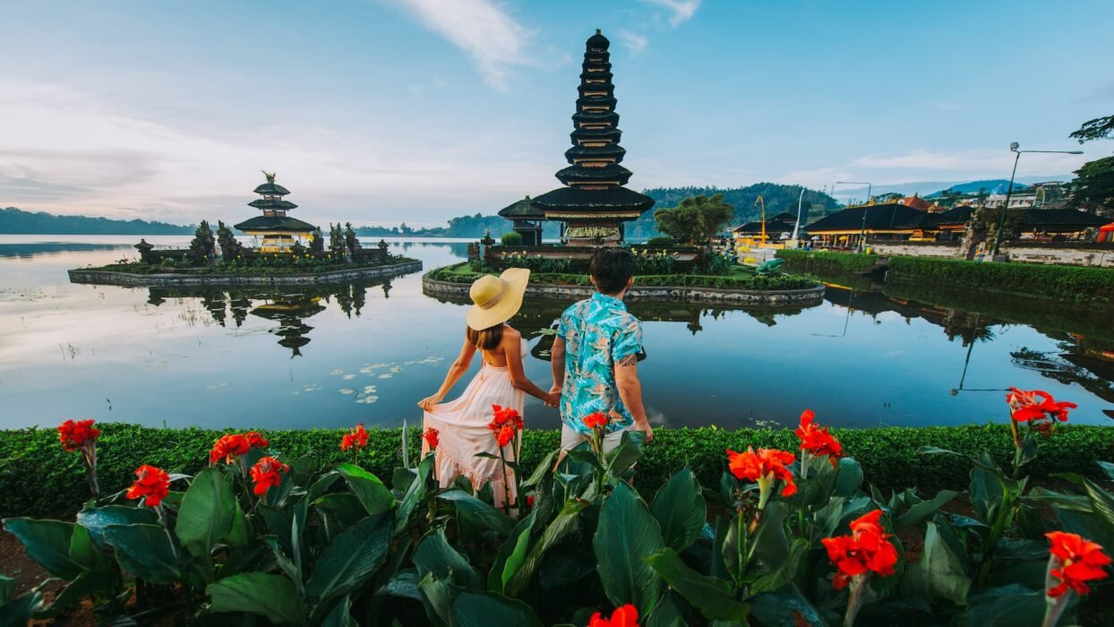 Couple enjoying Bali tour packages for couples and families at temple